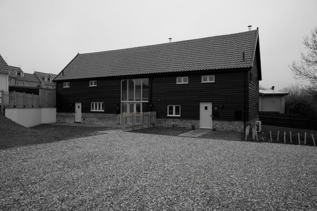 Sustainable Barn Conversion exterior black and white